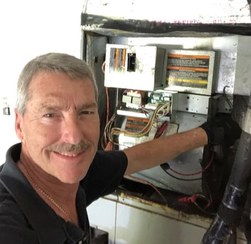 Kevin, an experienced HVAC technician at Temp Systems Service, providing professional air conditioning repair in South Florida